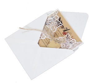 Elegant laser cut wedding invitation set with kraft paper inserts and rustic twine decor