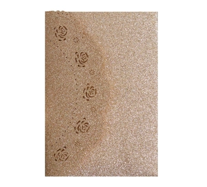 Detail of rose gold laser-cut glitter card showing intricate floral hollow rose patterns