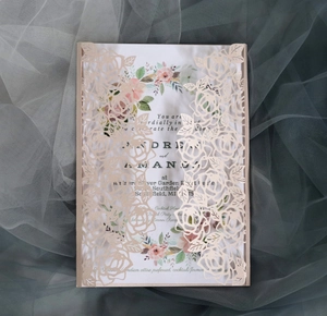 Champagne gold laser cut floral wedding invitation with romantic mesh fabric background