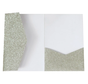 Macro detail of bifold silver glitter invitation pocket with double v-cut inner slots