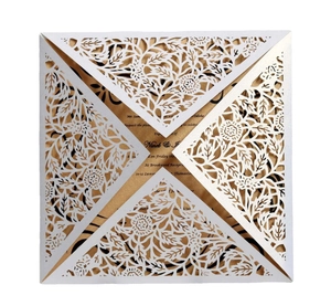White laser-cut floral wedding invitation with elegant hollow rose lace and gold inner card