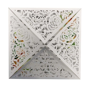 Elegant white laser-cut rose invitation card with detailed floral lace pattern for weddings