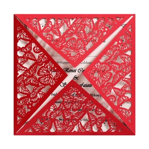 Laser cut red lace wedding invitation with intricate butterfly hollow pattern and white insert