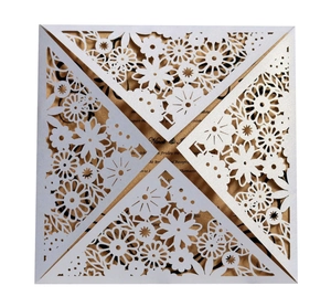 Intricate laser-cut floral patterns on white pearlescent paper wedding invitation with gold insert