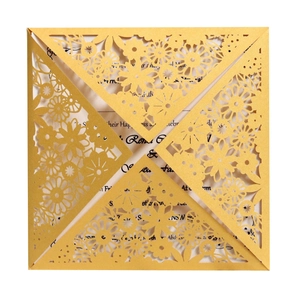 Elegant gold laser-cut floral wedding invitation card with white pearlized insert