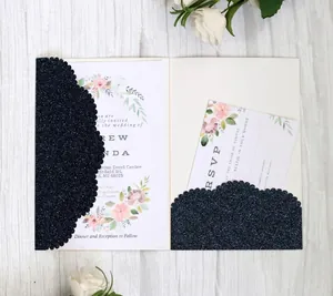 Detailed set of navy blue laser-cut wedding invitation with gold glitter and floral RSVP card