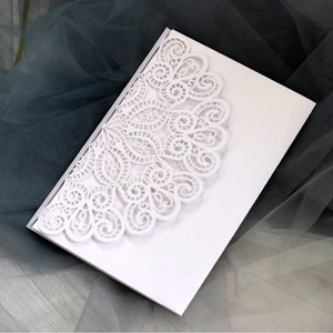 Laser cut white pearl paper wedding invitation with delicate lace hollow pattern design