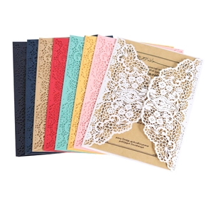 Laser cut floral wedding invitation set with intricate lace patterns in multiple colors
