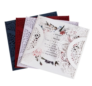 Detailed laser-cut wedding invitations showing lace hollow patterns in multiple colors