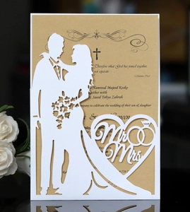 Detailed laser cut wedding invitation with elegant Mr & Mrs silhouette and floral pattern