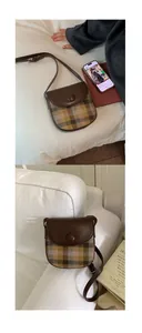 Detail of vintage plaid fabric crossbody bag with brown leather trim and flap closure