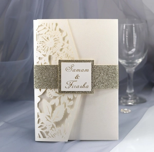 Laser-cut hollow floral wedding invitation with gold glitter band and cream pearlescent paper