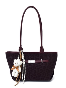 Deep burgundy leopard print tote bag for women with plush bear charm and shoulder strap
