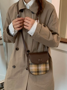 Retro plaid saddle shoulder bag with brown leather flap and round buckle for women