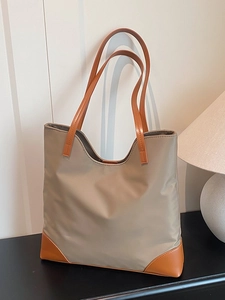 Chic khaki nylon tote bag with brown leather accents for office and casual style