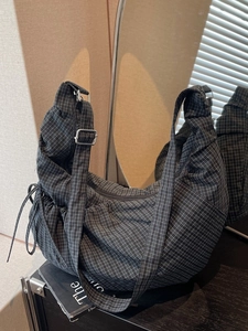 Checkered canvas hobo bag with adjustable strap and drawstring for women casual style