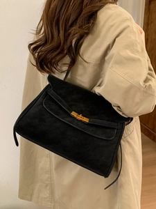 Retro matte black suede handbag with classic metal clasp and strap for casual daily use