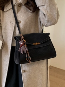 Vintage black matte leather handbag with gold twist lock and cute bear charm for women