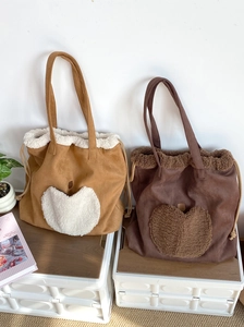 Chic autumn winter faux suede tote bag with plush heart trim and drawstring closure
