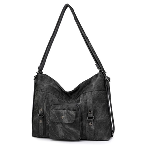 Detail of grey hobo bag with vintage washed texture, metal studs and zipper pockets