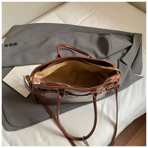 Top view of spacious interior compartment in dark brown vintage leather tote bag