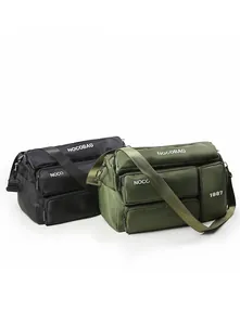 Detail view of durable nylon messenger bags in black and olive green with multiple pockets