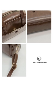 Vue détaillée du grand sac cabas marron avec fermeture éclair dorée et boucle aimantée