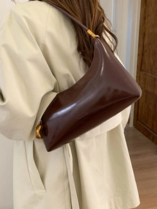 Retro dark brown glossy underarm hobo bag with gold metal pendant and strap