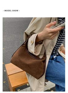 Deep brown suede hobo bag shown in a lifestyle model shot for a casual retro aesthetic