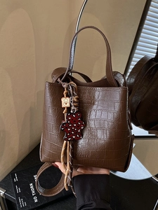 Vintage dark brown crocodile pattern bucket bag with bear charm and adjustable strap