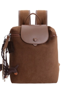 Large capacity dark brown nylon backpack with leather flap for travel and commute
