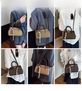 Vues détaillées du sac seau élégant avec fermoir métallique en plusieurs styles de port