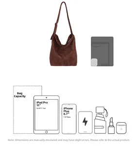 Detail showing high-capacity brown suede hobo bag fitting iPad Pro and daily essentials
