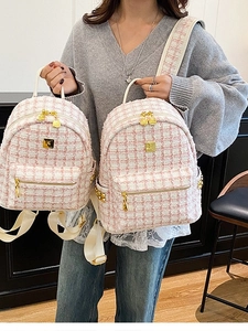 Pink and white tweed quilted backpack with gold hardware and front pocket for women