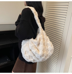 Close-up of plush white checkered tote bag showing soft faux fur texture and large capacity