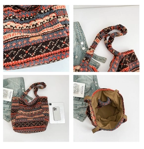 Macro detail of ethnic lamb wool tote bag featuring geometric patterns and durable stitching
