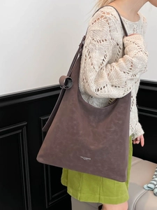 Large vintage brown faux leather hobo shoulder bag for women with minimalist brand print