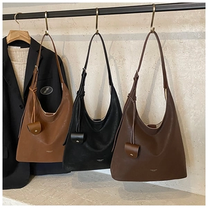 Minimalist large leather tote bags in brown and black colors with mini coin pouches