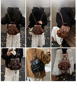 Detail view of vintage PU leather backpack with drawstring closure and buckled side pockets