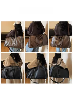 Vues détaillées du grand sac de voyage en finitions cuir noir et couleur café