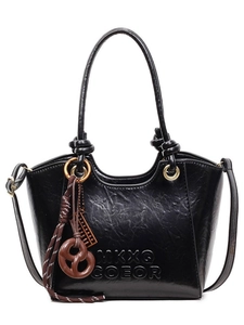 Retro black faux leather bucket bag with embossed logo and decorative charms