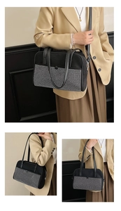 Detail of black rectangular shoulder bag with white rhinestone grid and long strap
