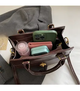Top view showing the spacious interior of a vintage oil wax leather crossbody handbag