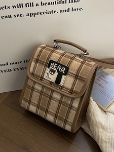 Sac à dos vintage à carreaux marron pour femme avec écusson ours et anses en cuir