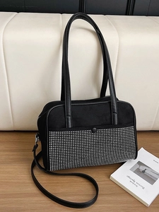 Black suede Boston bag with silver studs and adjustable shoulder strap for women