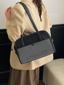 Sparkly knotted rhinestone shoulder bag with silver studs and black leather strap for women
