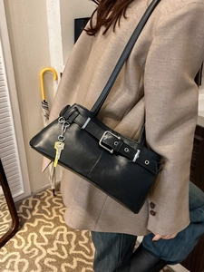 Retro black faux leather shoulder bag with buckle detail and gold key charm
