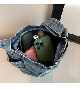Internal view of the spacious denim tote bag showing its large storage capacity