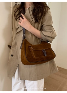 Caramel suede hobo bag with silver buckle pocket and retro contrast piping detail