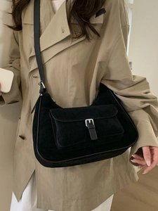 Fashionable black suede hobo shoulder bag for women with silver buckle detail